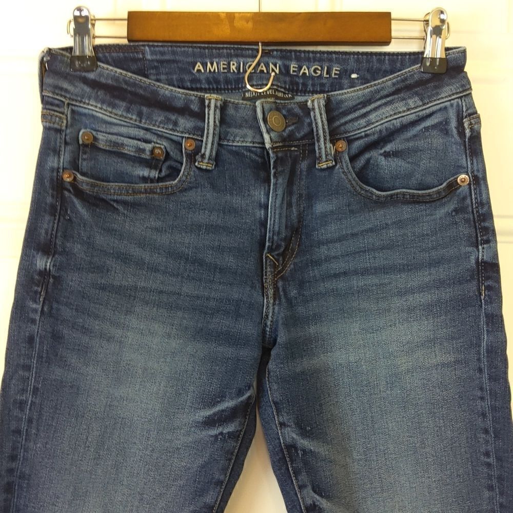 American Eagle five pocket blue denim mildly distressed skinny jeans